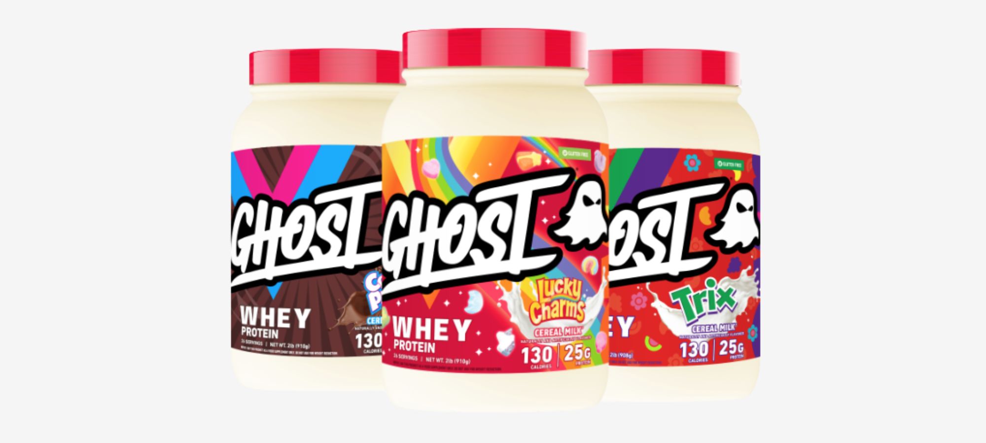 ​​Three tubs of GHOST® WHEY CEREAL MILK® arranged together on a white background.